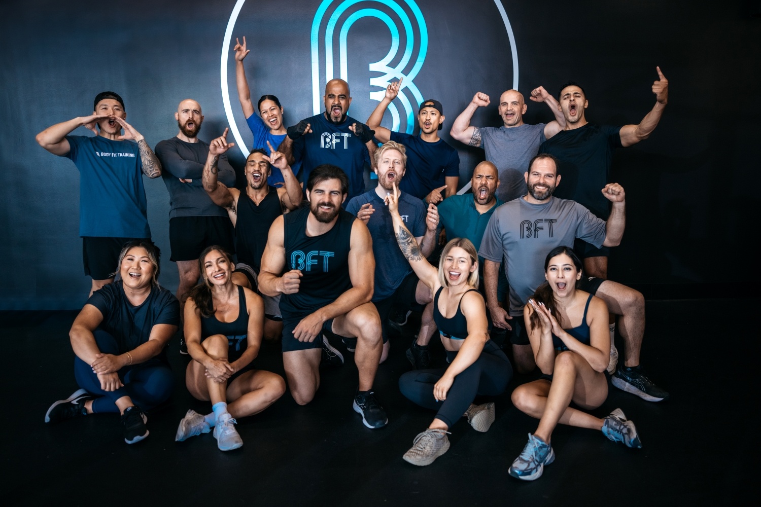 Happy group of attendees at a Body Fit Training studio